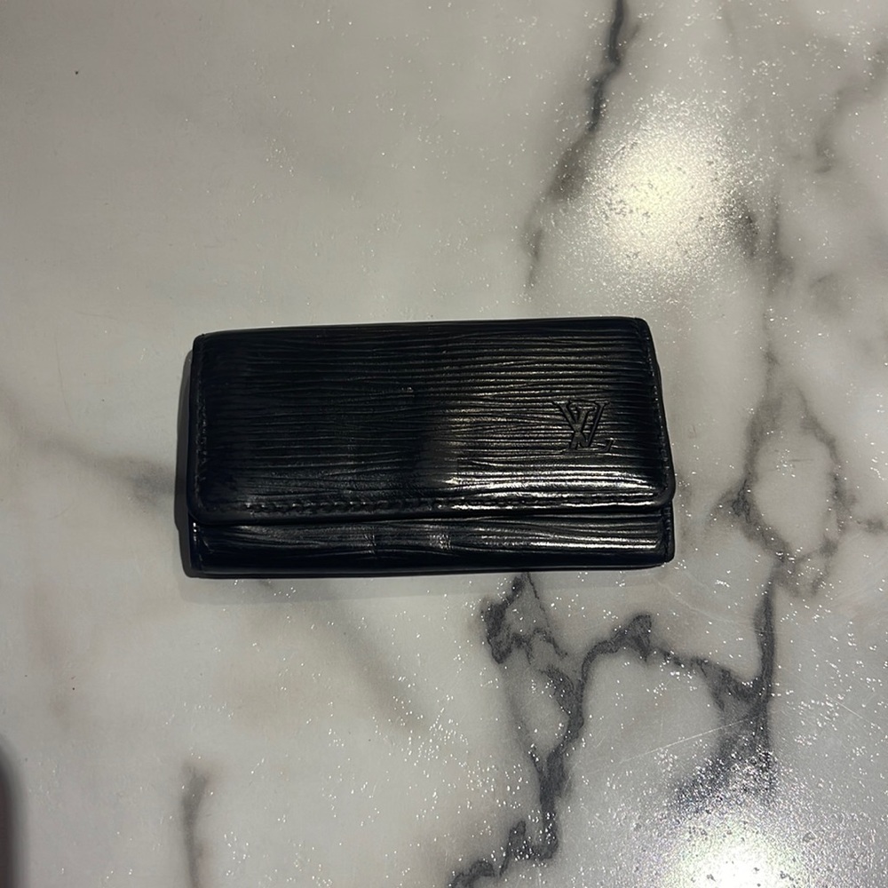 Authentic Louis Vuitton Epi Black 4 hooks Key Holder